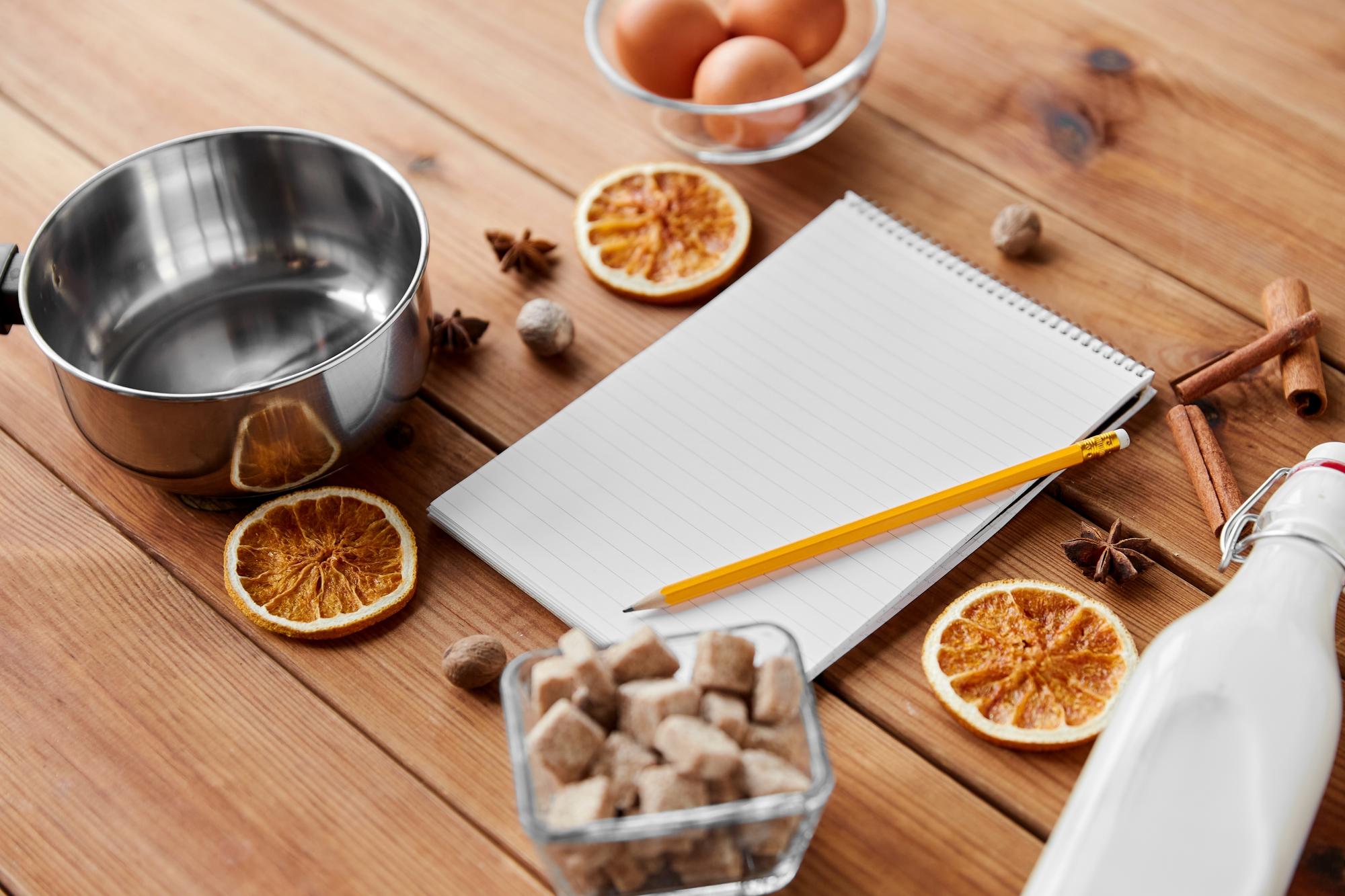 studio kitchen countertop with ingredients and open notebook